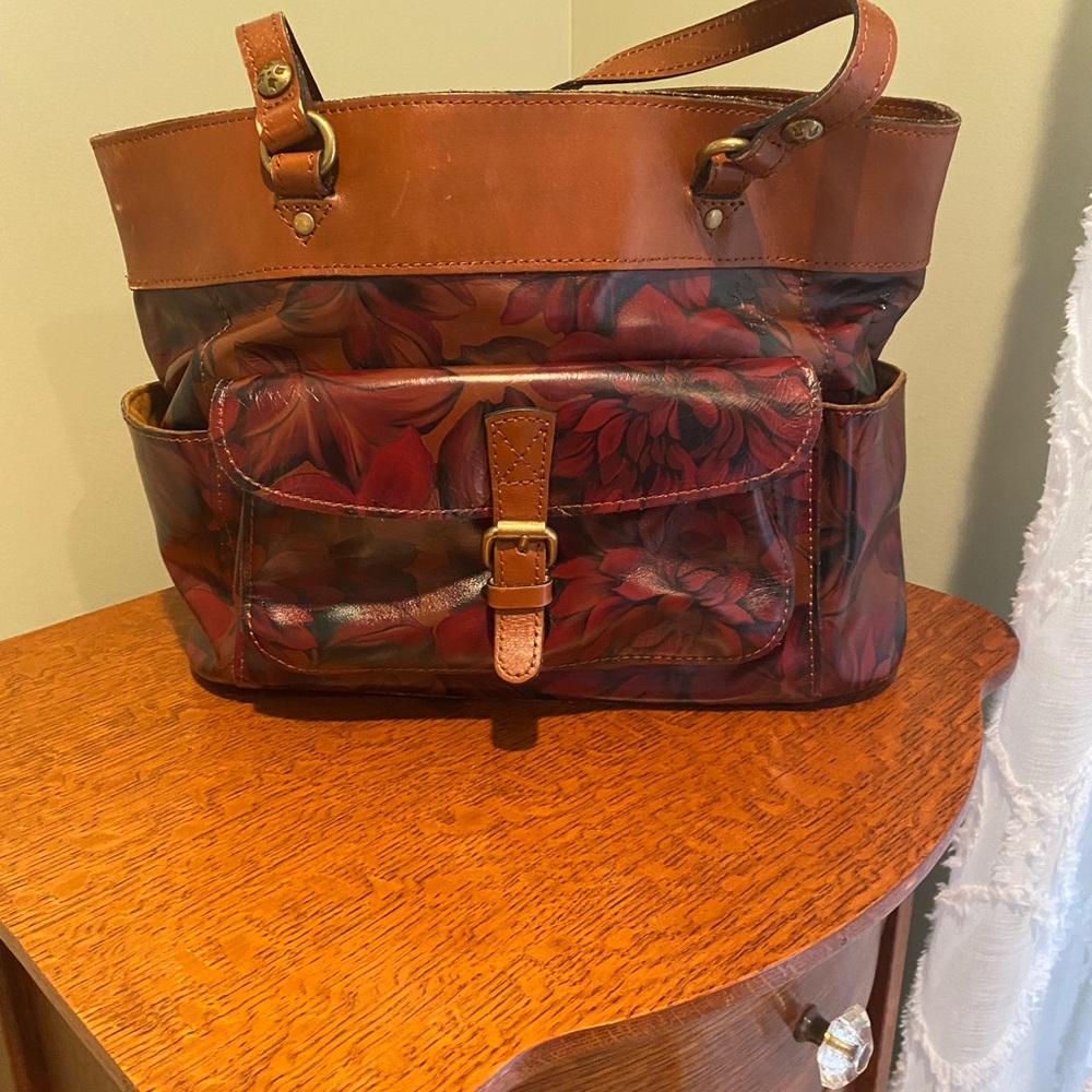 Patricia Nash Brown and burgundy floral print.  Beautiful bag no stains or tears